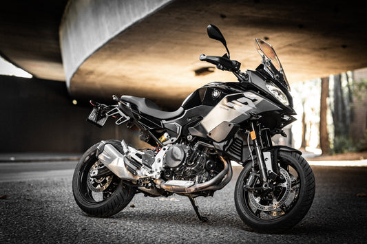 BMW F900XR Triple Black under freeway underpass