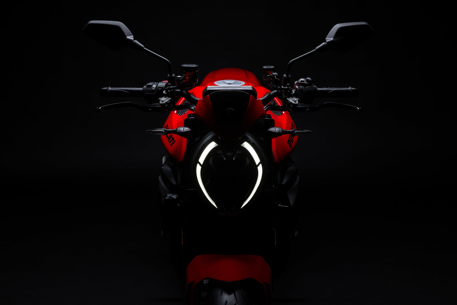 Ducati Monster in a photo studio black background