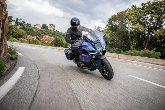 BMW R1300RT on twisty mountain road