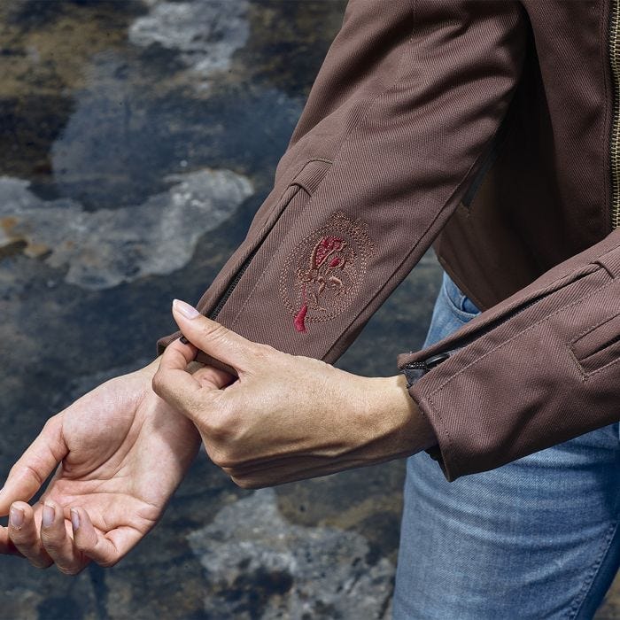 close up of sleeeve of Segura SEGURA ETERNAL WOMENS MOTORCYCLE JACKET MAROON